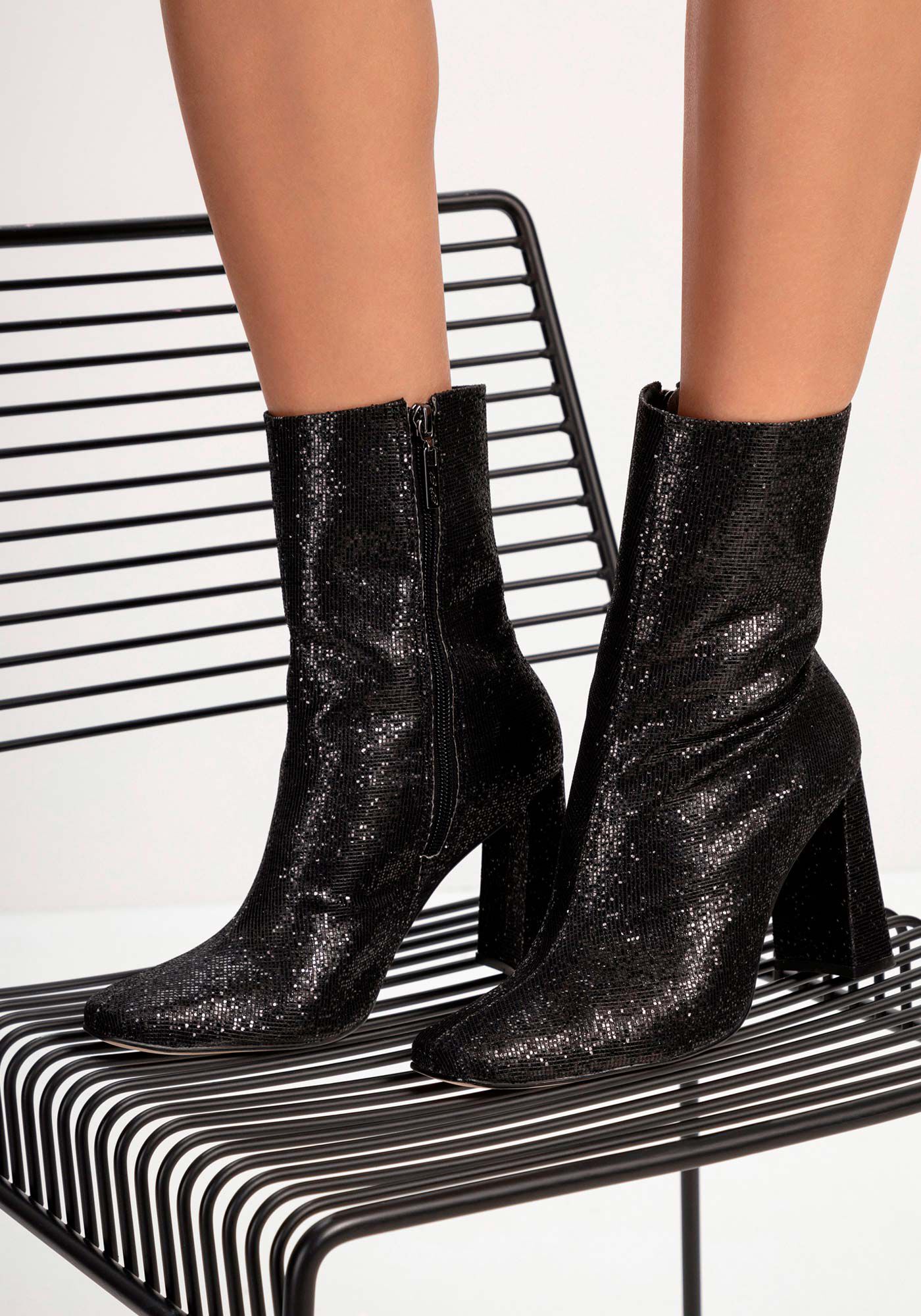 Botas salto clearance medio
