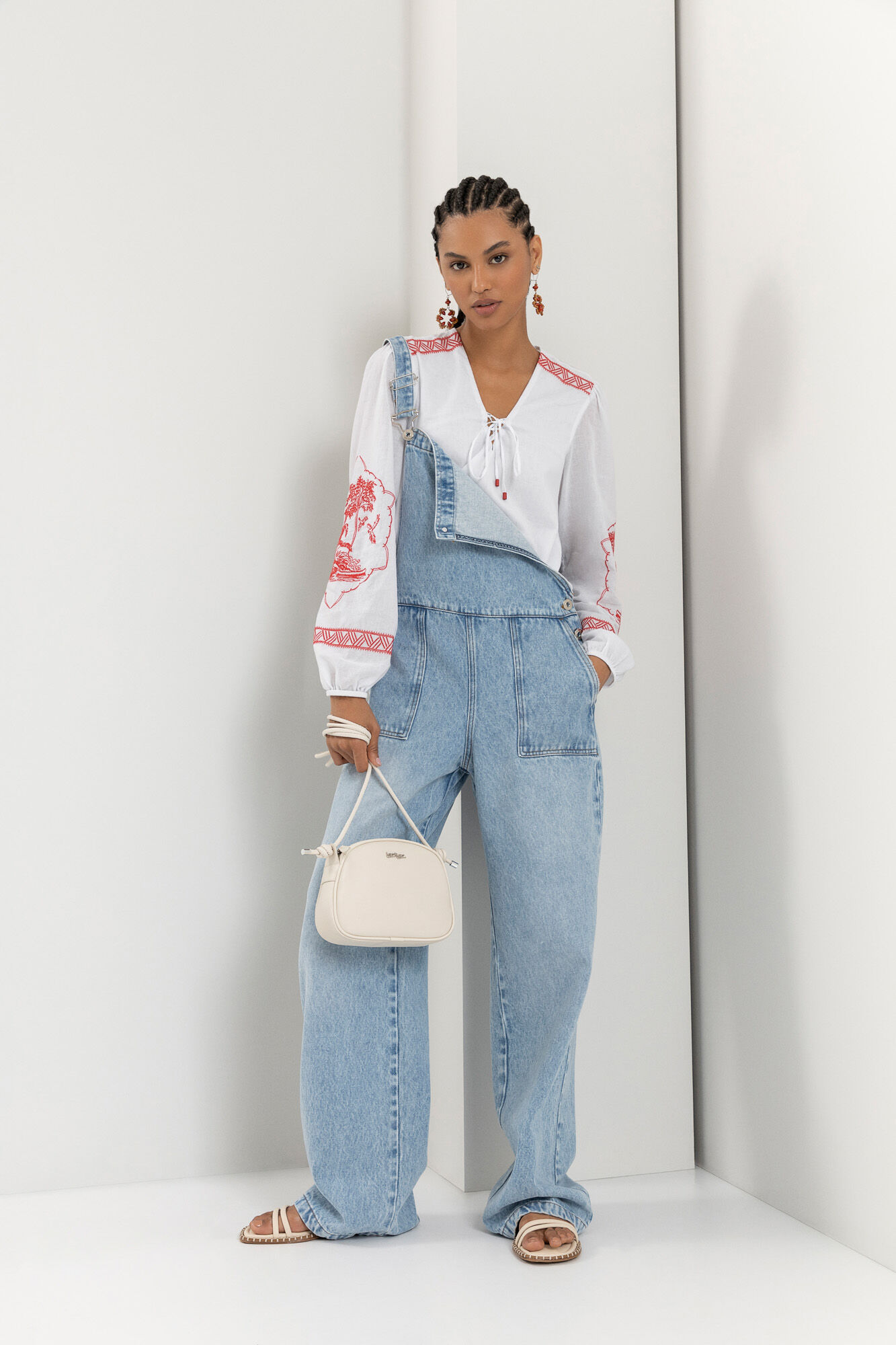 Jardineira jeans best sale longa saia