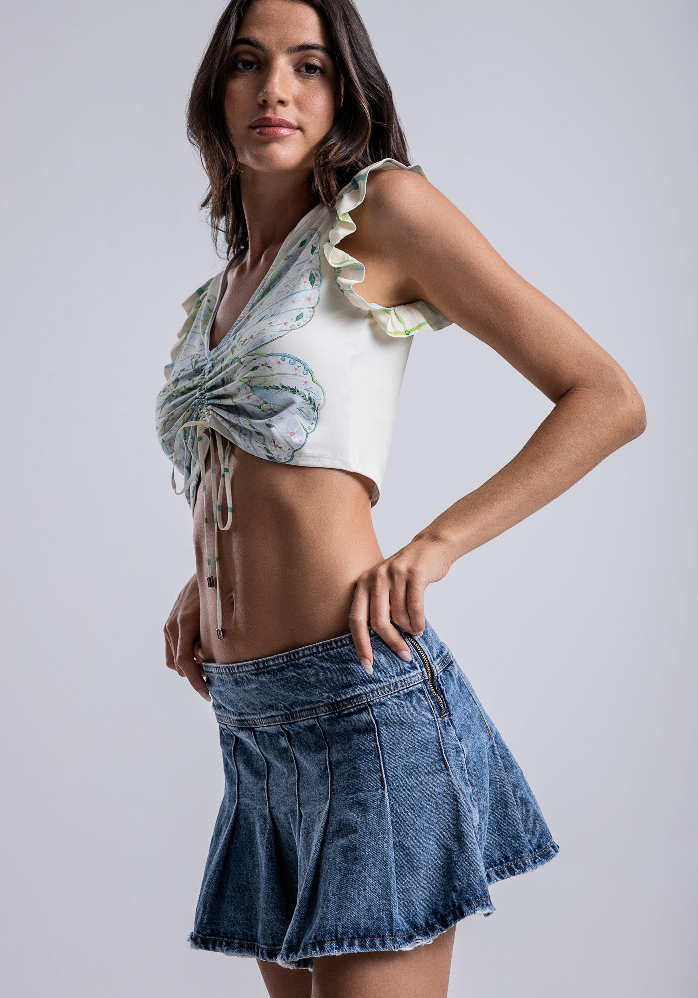 Mini Saia Jeans Cintura Baixa com Pregas Lez a Lez